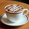 白のカップに入ったモカラテ。チョコレートシロップがトッピングされている。